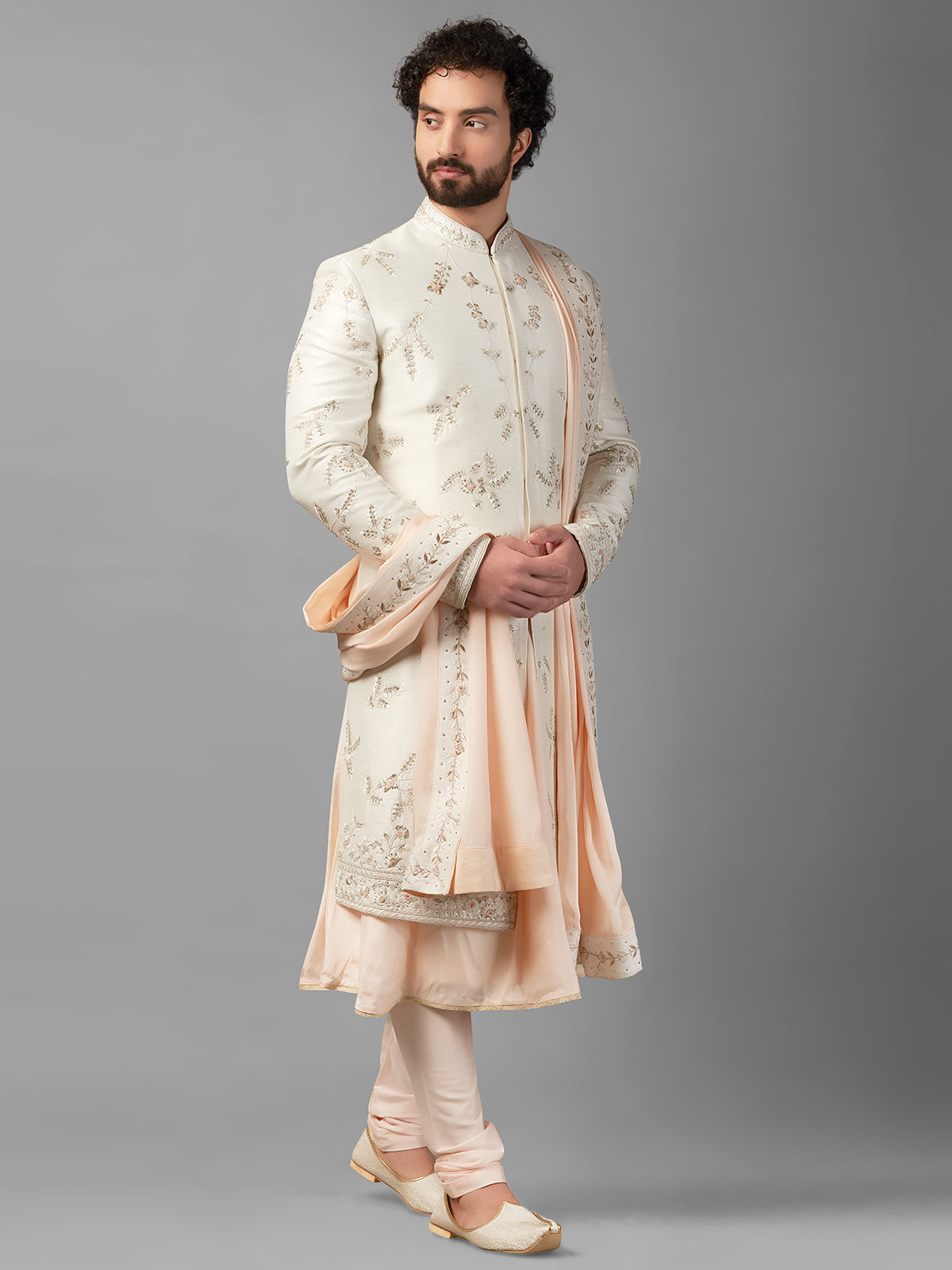 Cream and peach raw silk peshwai style sherwani