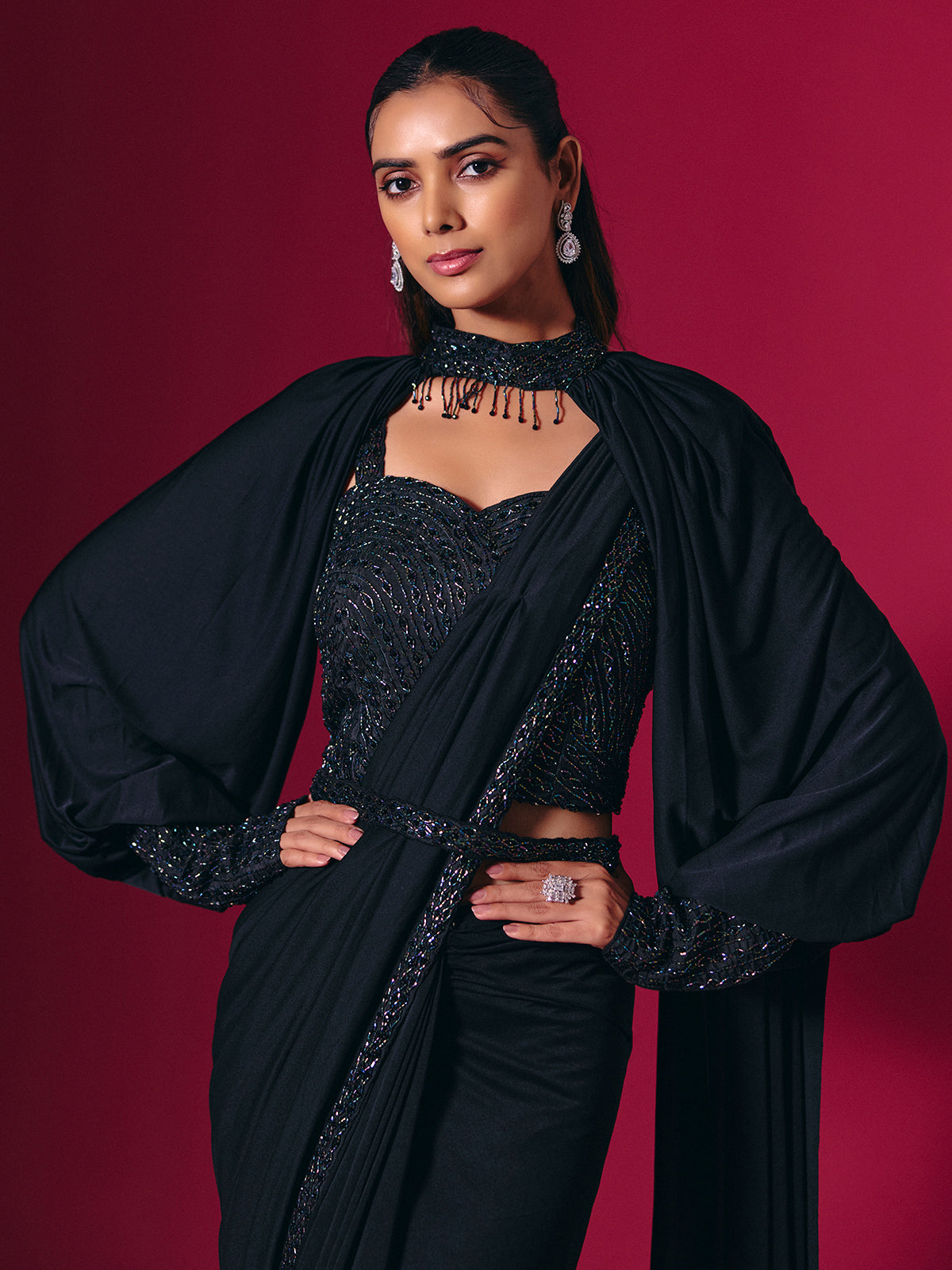Elegant black lycra saree with cutdana pearl work