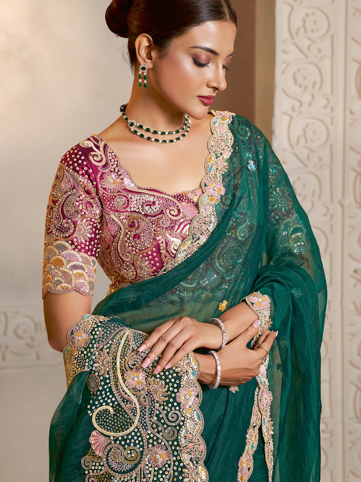 Emerald green organza satin saree of refined splendor