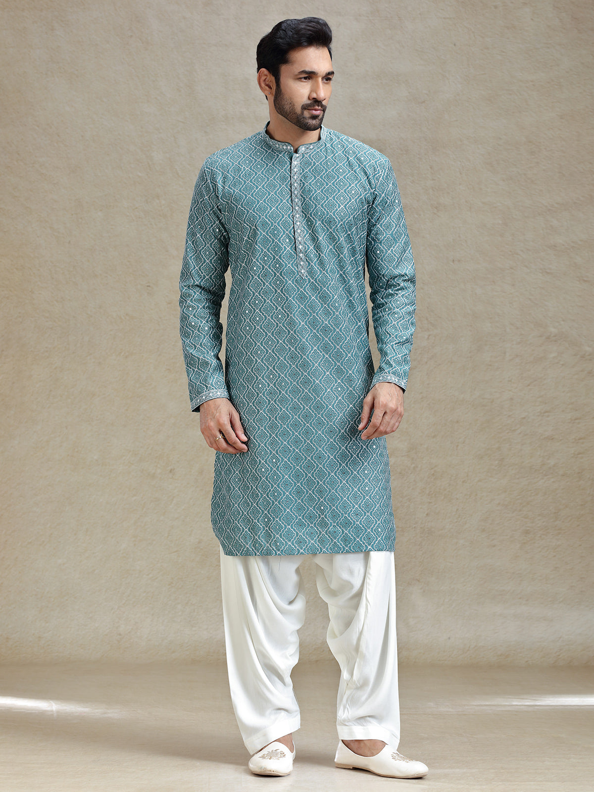 English green serene kurta set in symmetrical embroidery