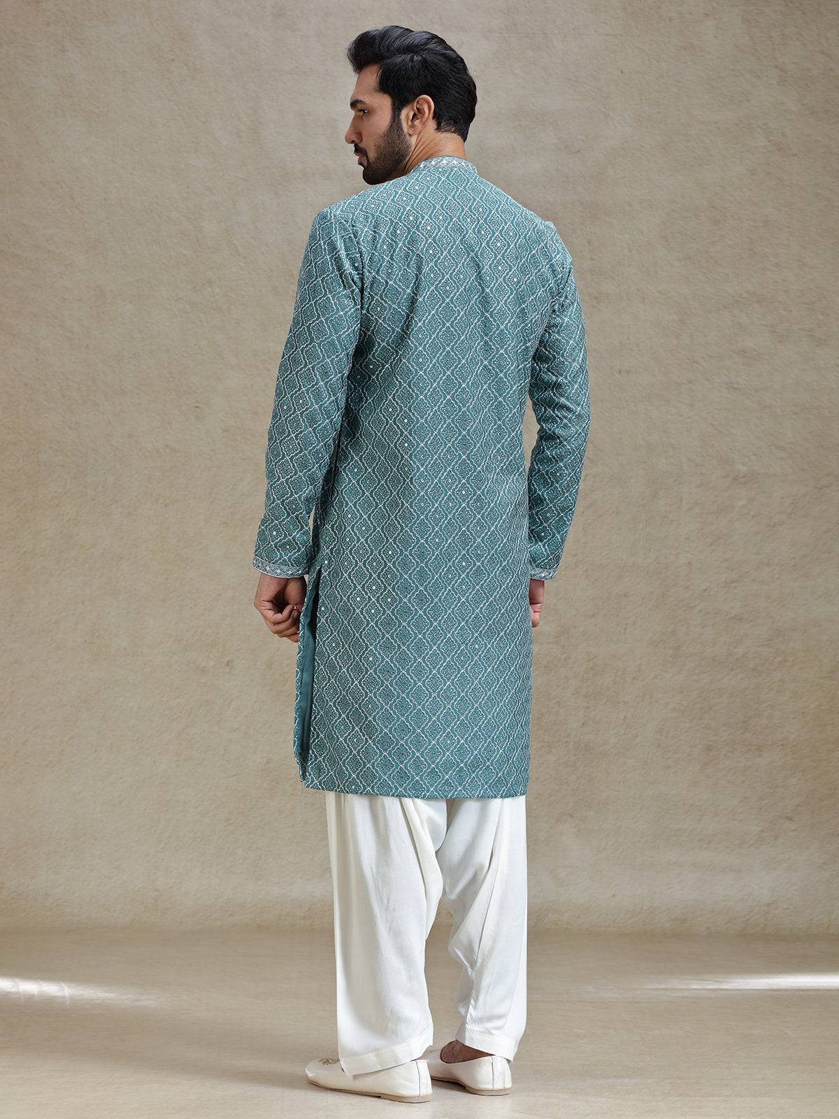 English green serene kurta set in symmetrical embroidery