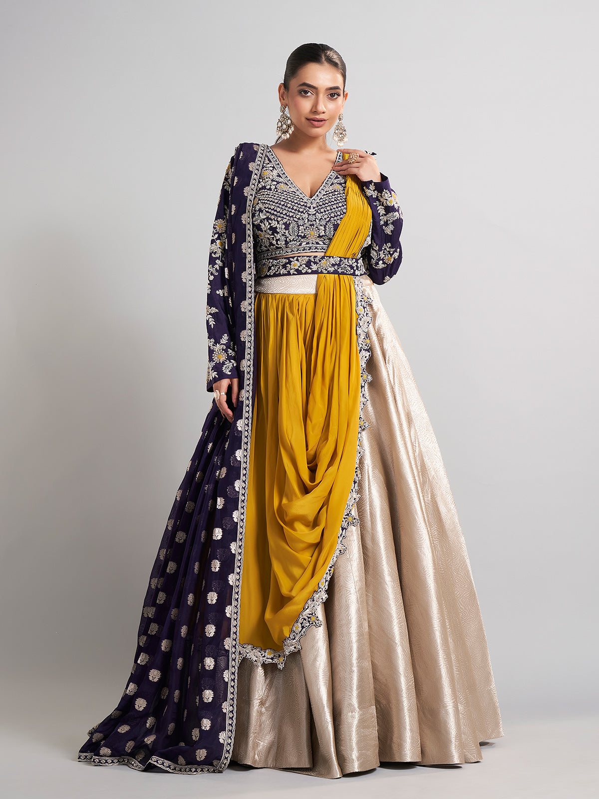 Golden and purple lehenga choli with attached dupatta