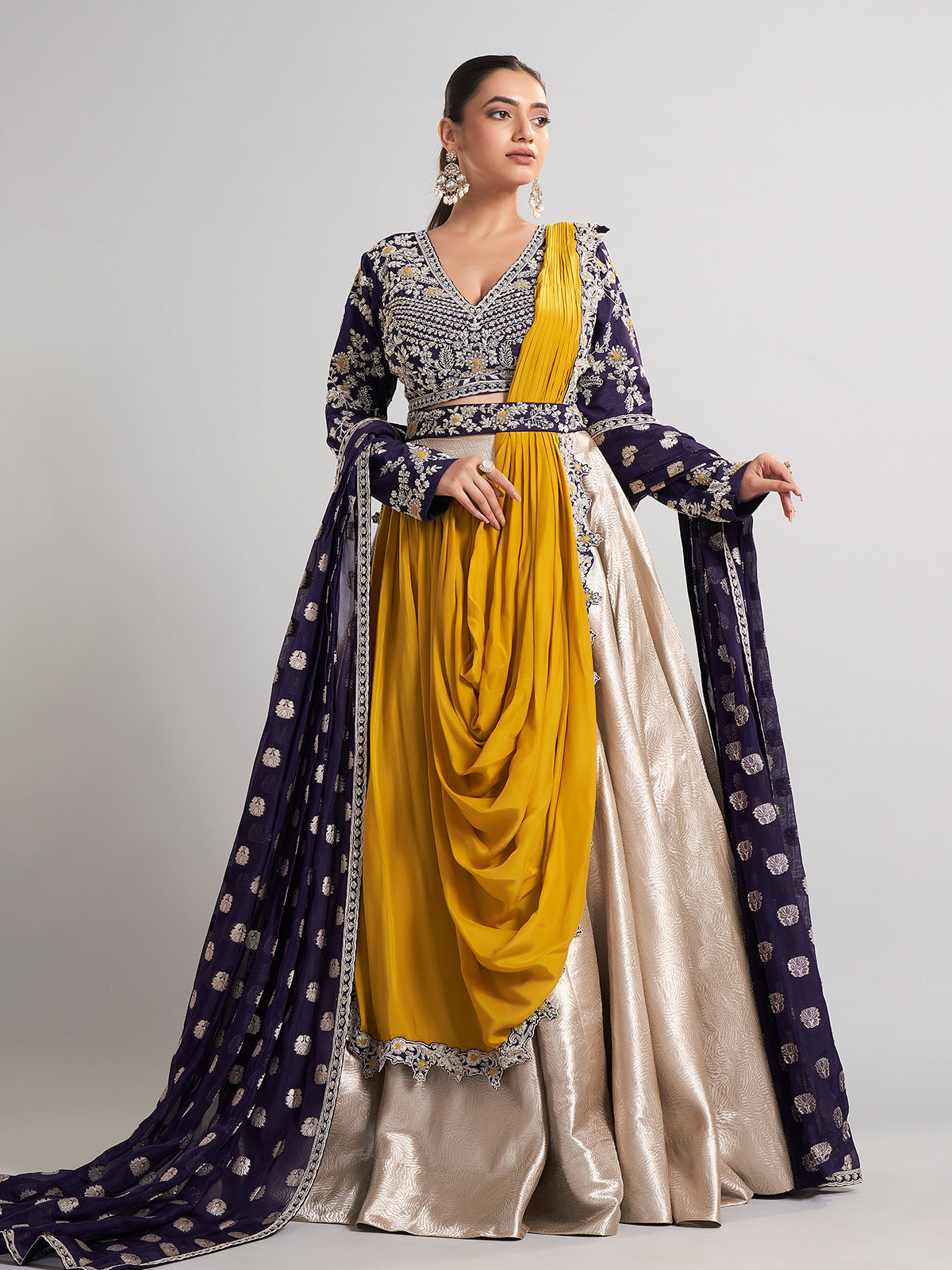Golden and purple lehenga choli with attached dupatta