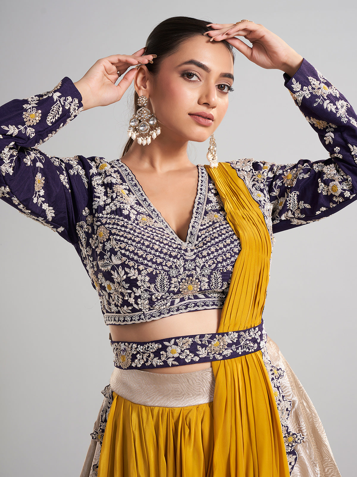 Golden and purple lehenga choli with attached dupatta