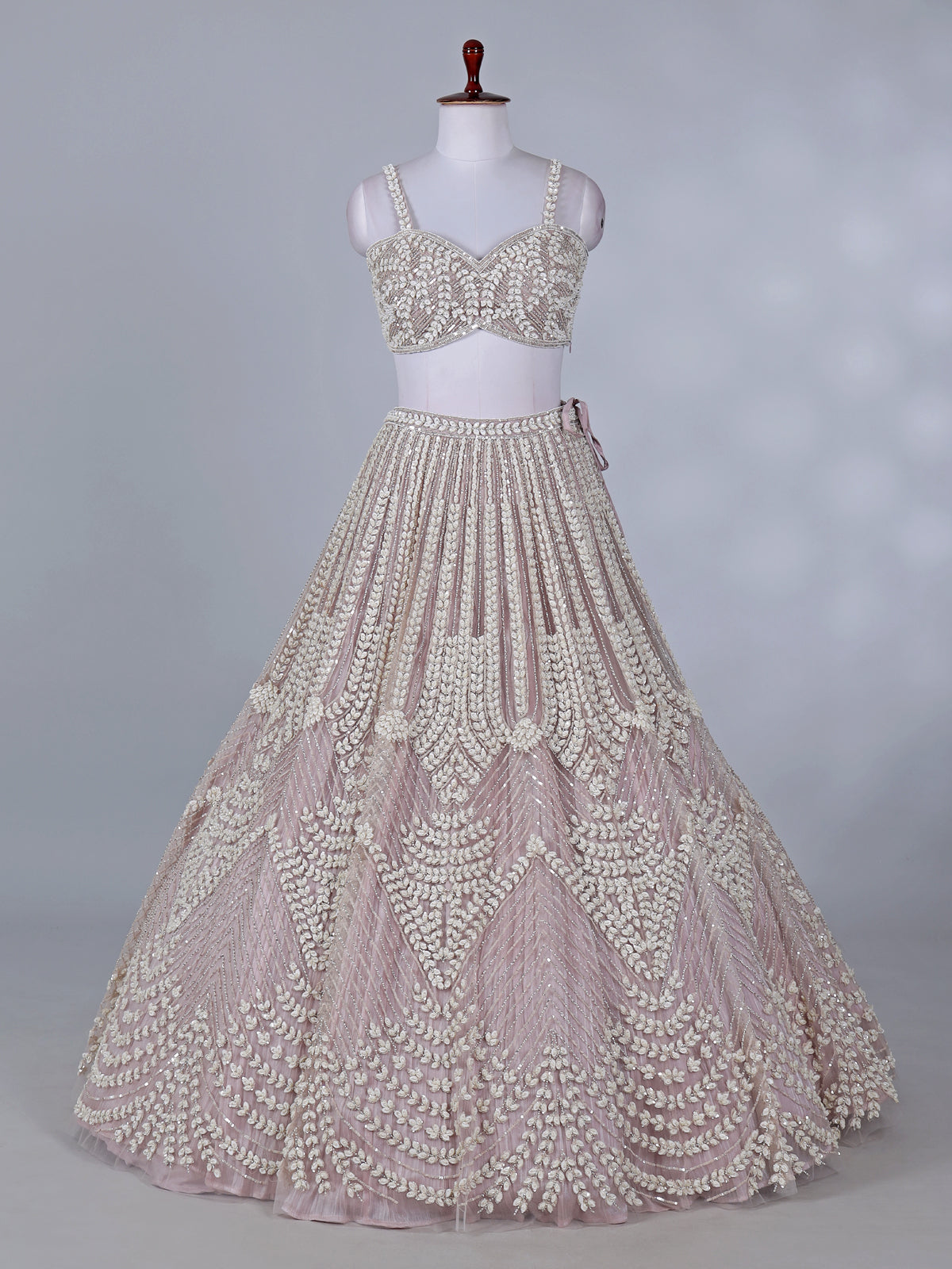 Light pink net lehenga choli for wedding celebration