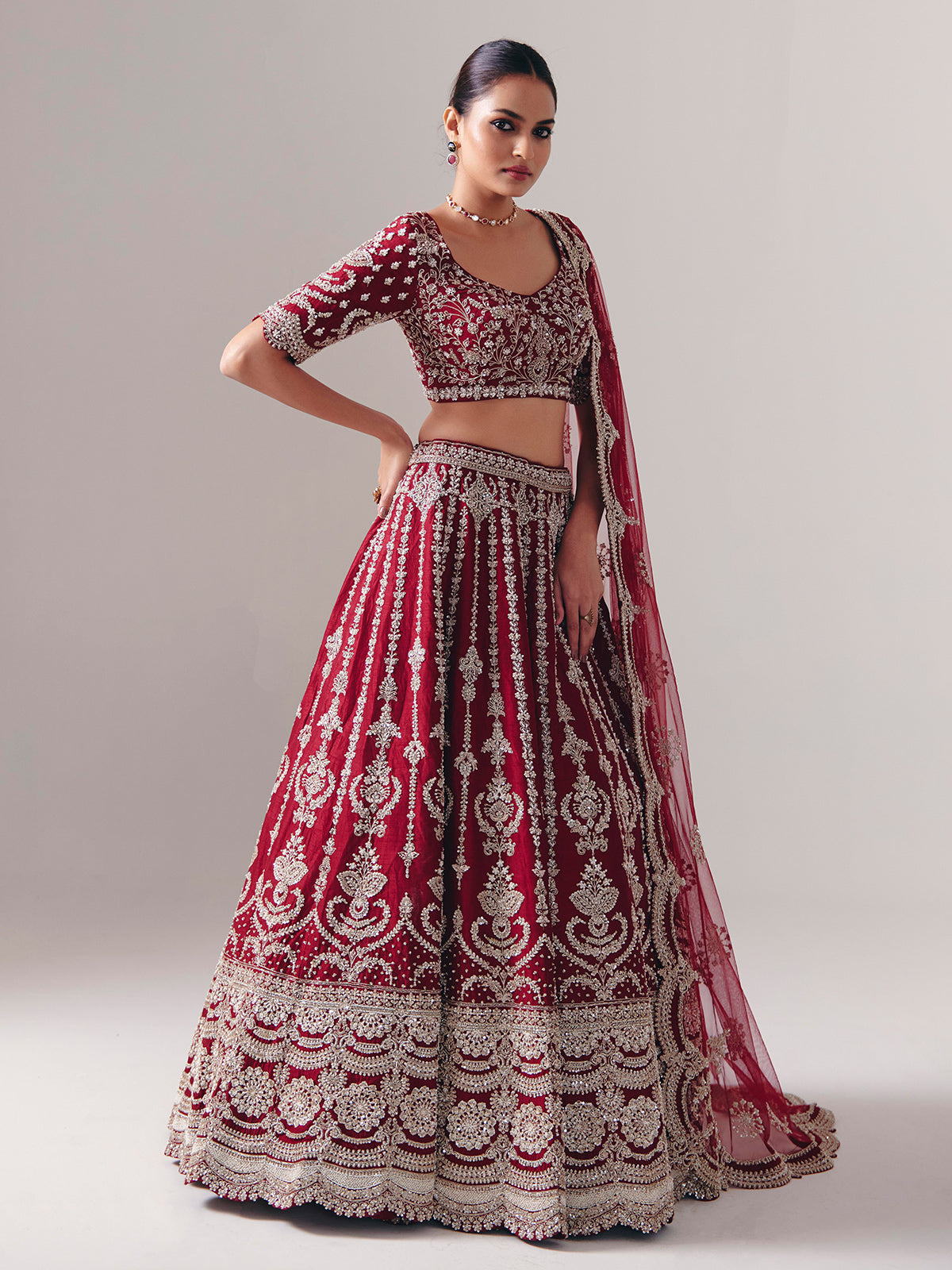 Maroon raw silk lehenga choli with zardosi and resham glow