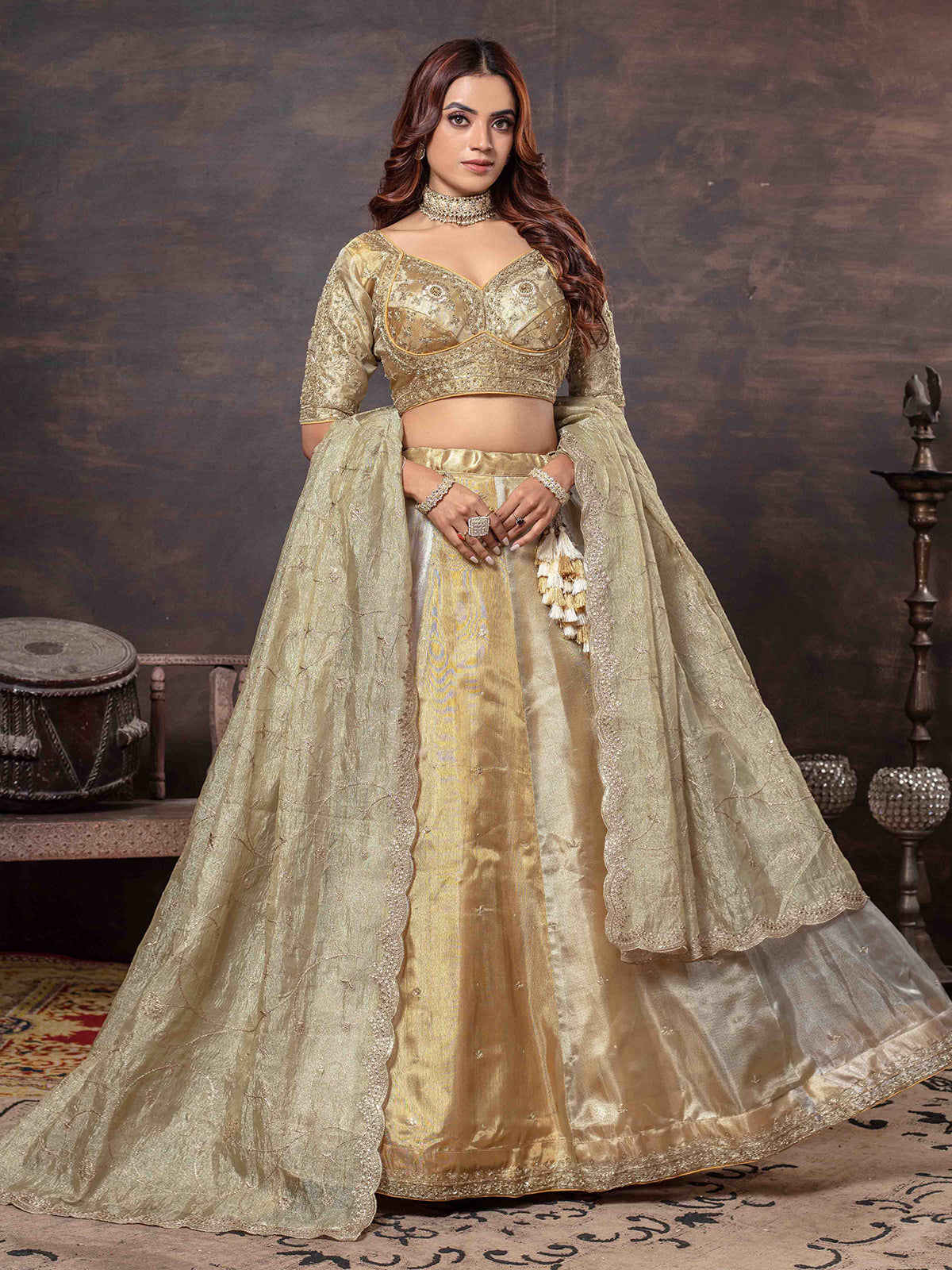 Golden lehenga choli with heavy weaving