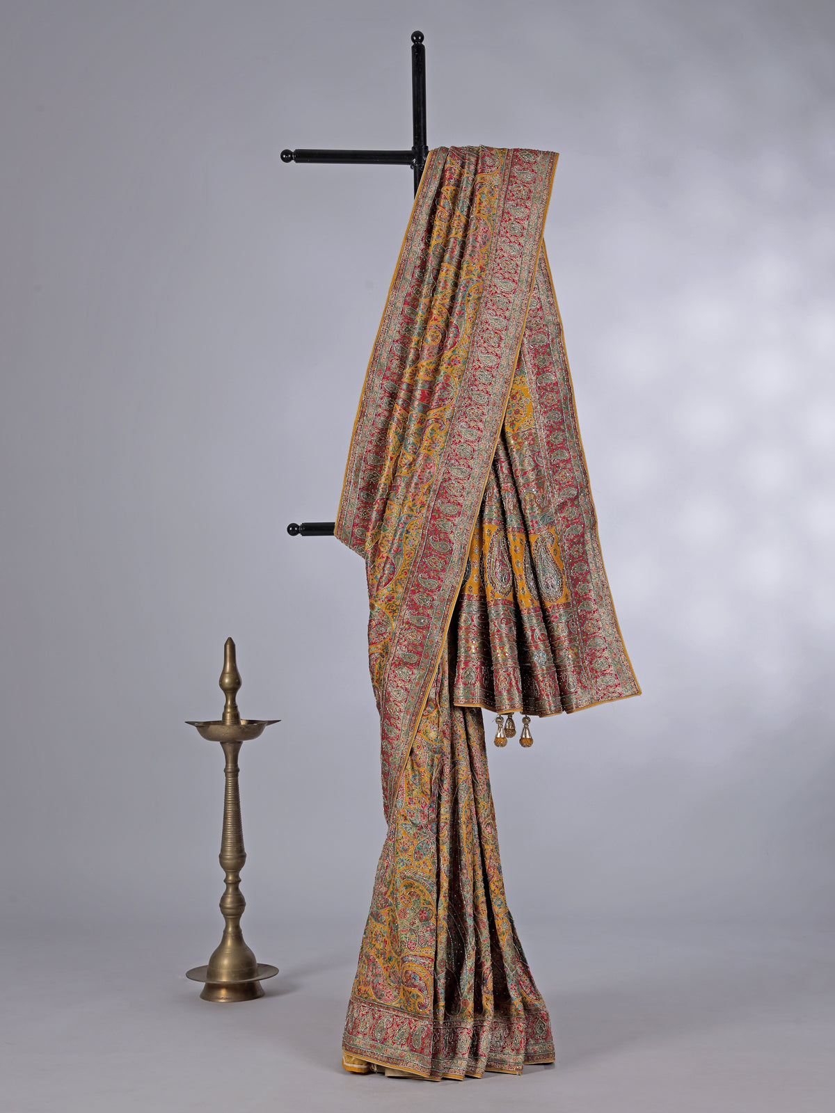 Mustard yellow pashmina silk motif work haldi saree