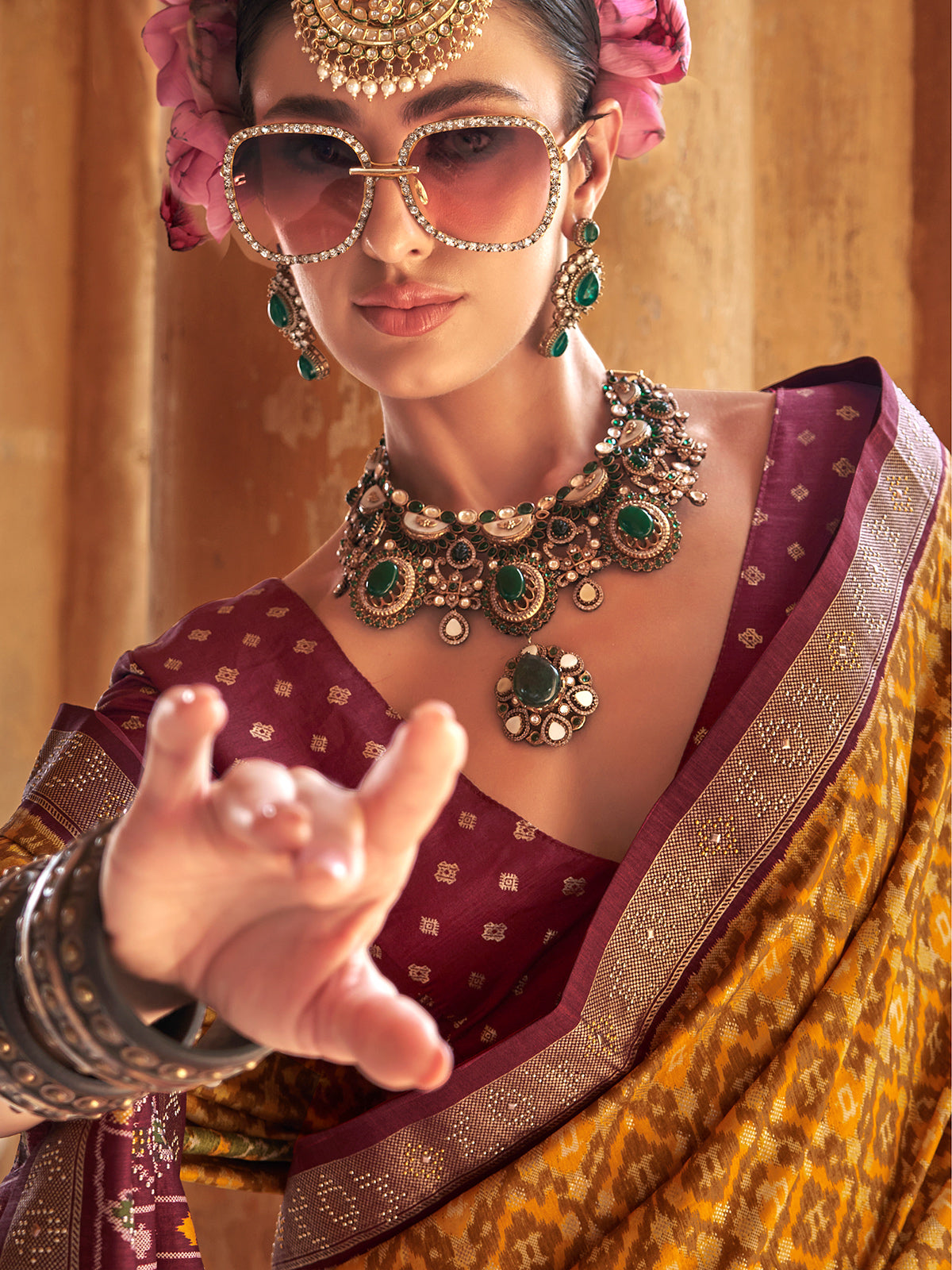 Mustard yellow vibrant patola saree
