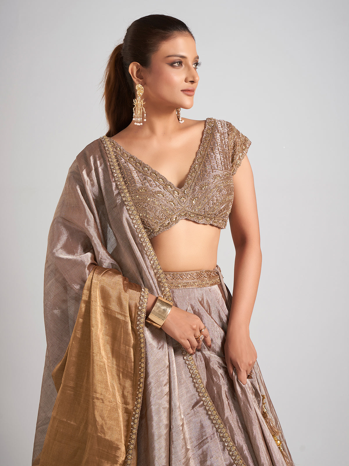 Pastel beige silk lehenga choli with elegant dupatta