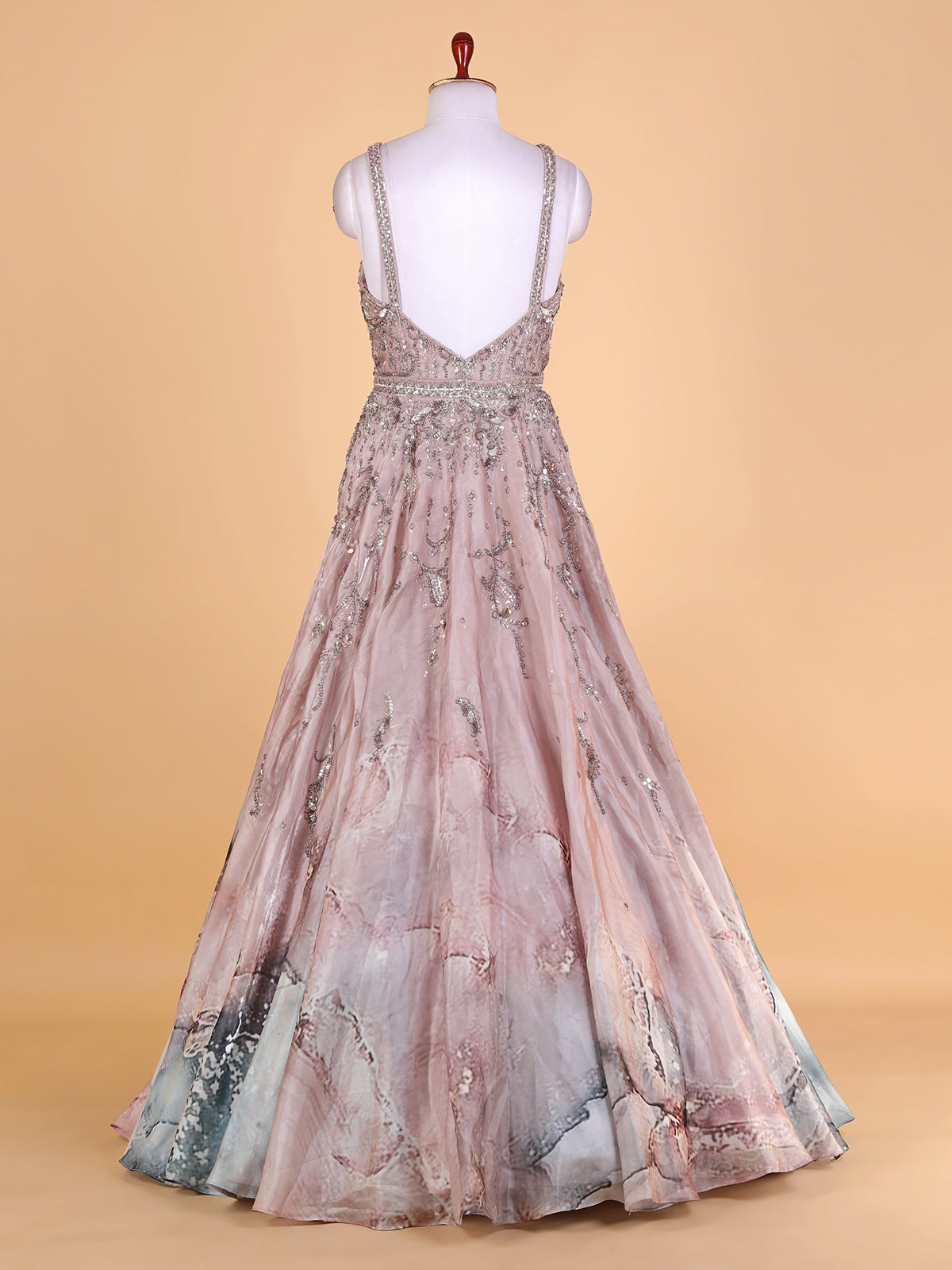 Peach printed designer gown in organza