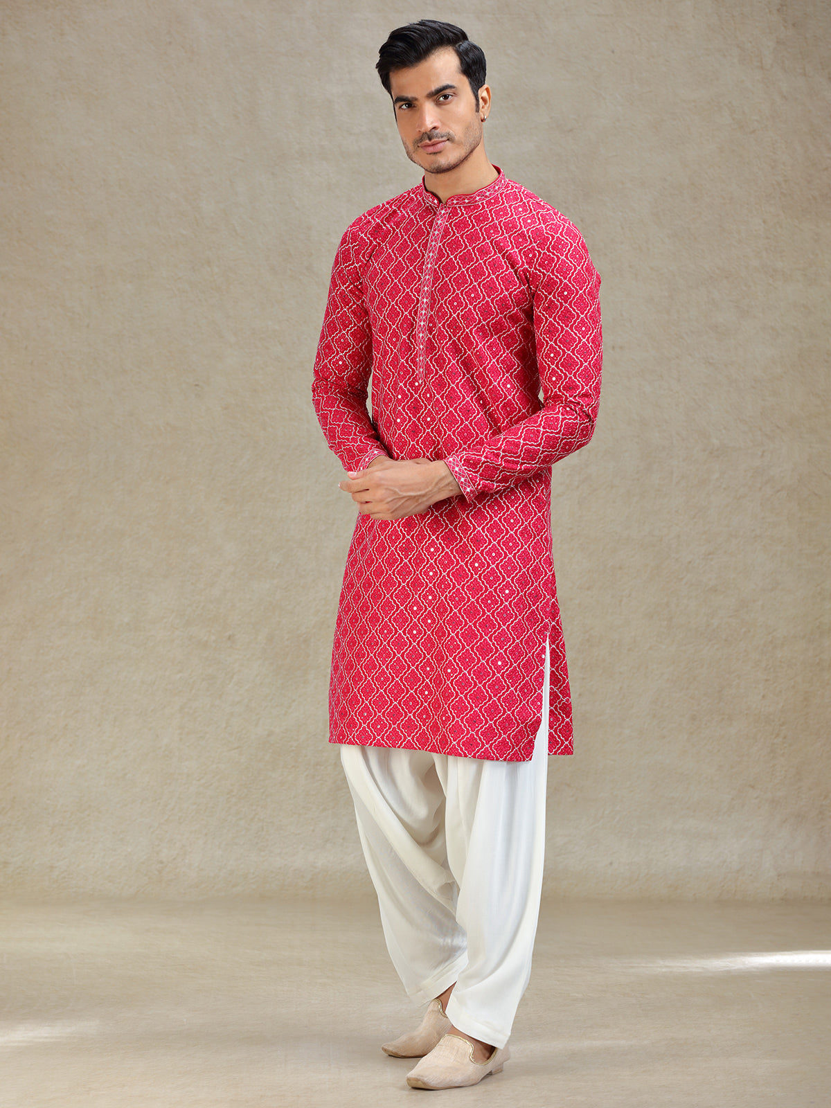 Pink kurta salwar in symmetrical embroidery pattern