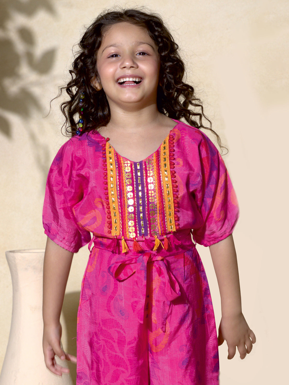 Pink silk printed jumpsuit for girls with belt