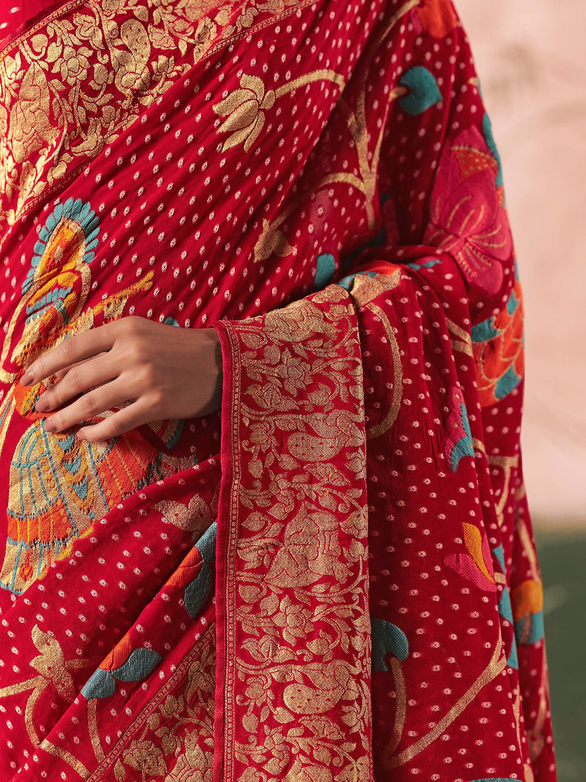 Red georgette bandhej zari woven festive saree