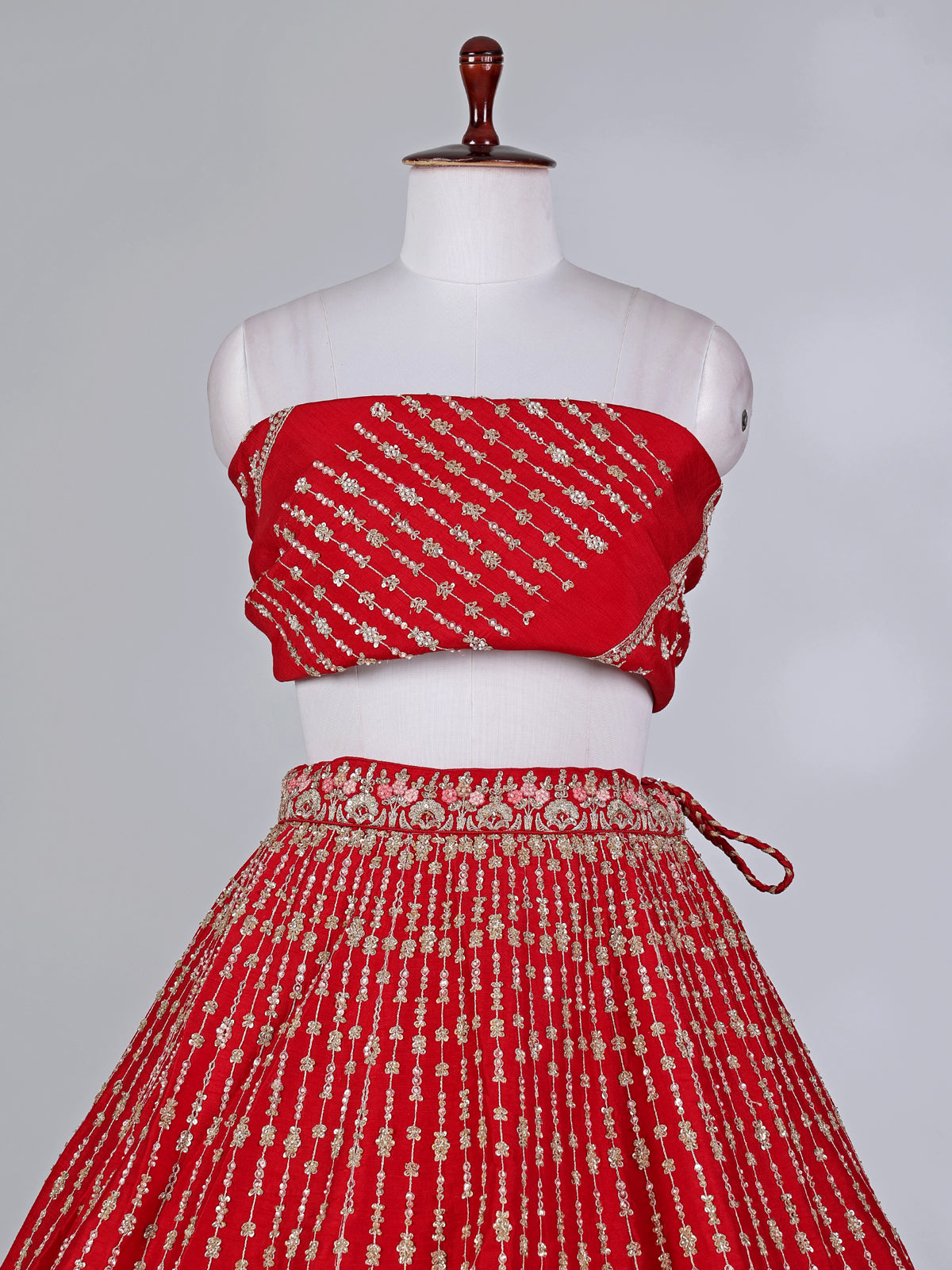 Red raw silk bridal lehenga choli with resham detailing