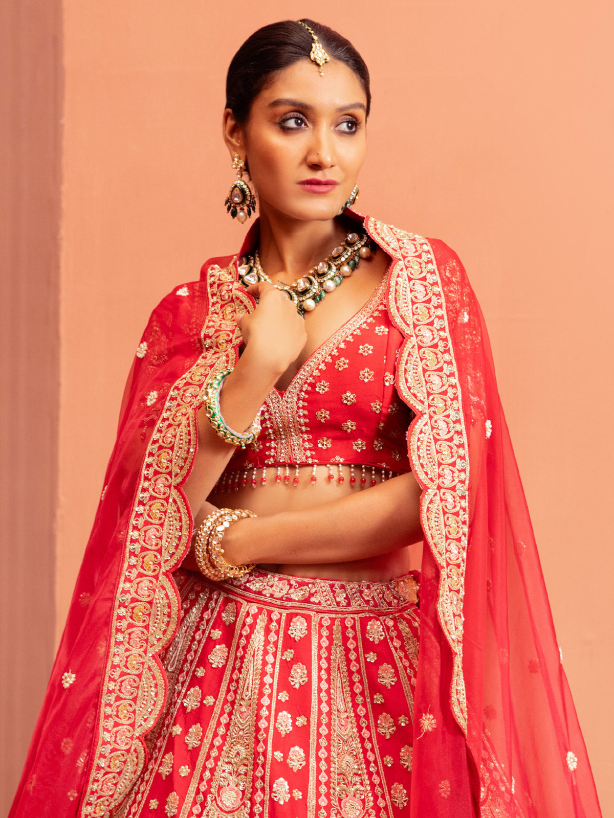 Red raw silk bridal lehenga choli with sweetheart neckline