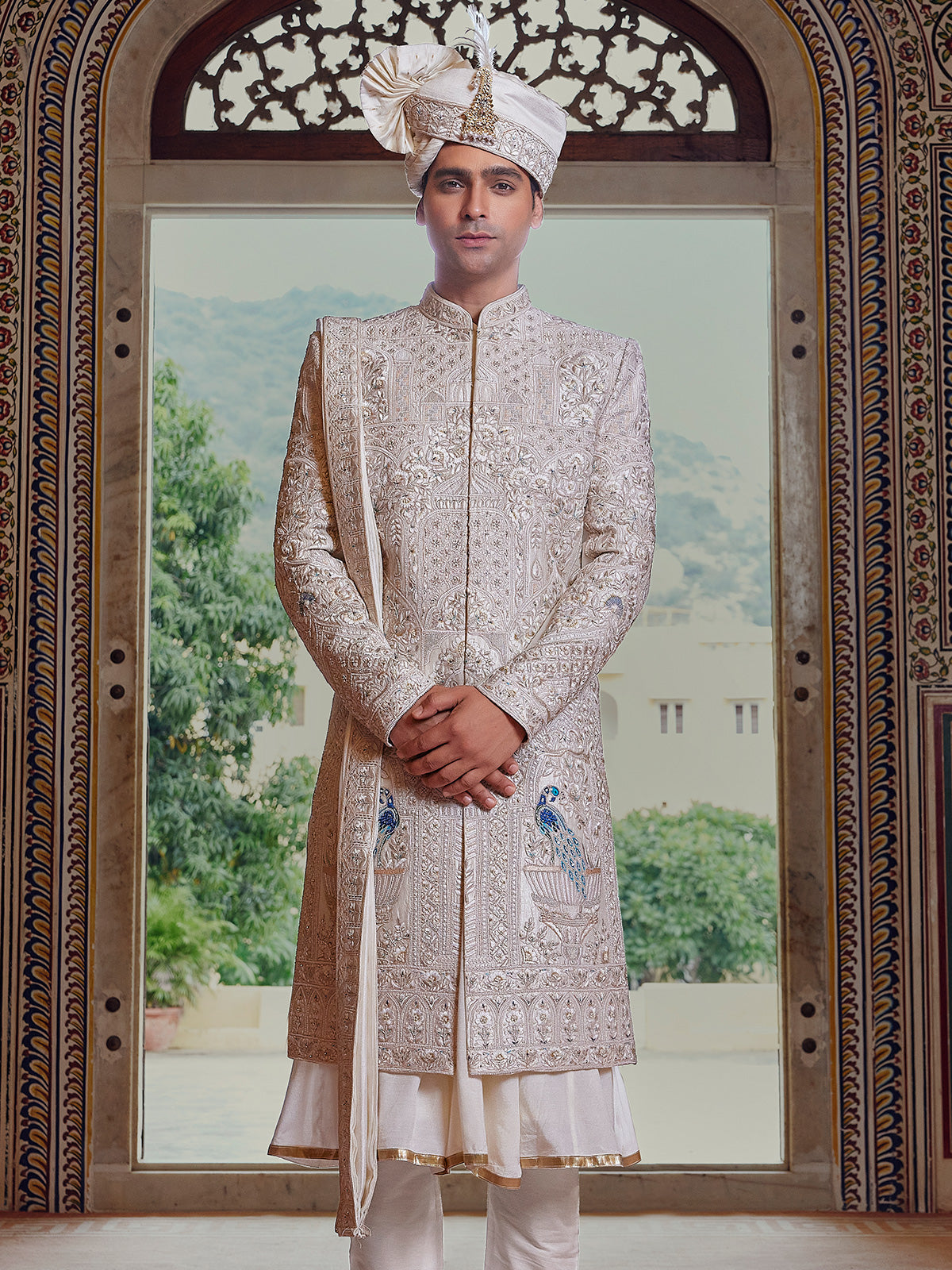 Royal cream peshwai style sherwani with resahm work