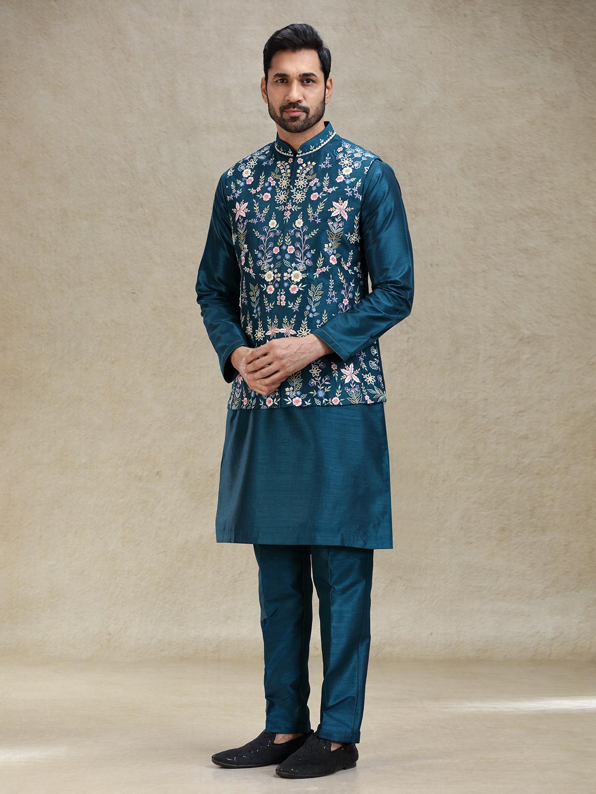 Teal blue beautifully embroidered silk kurta jacket set