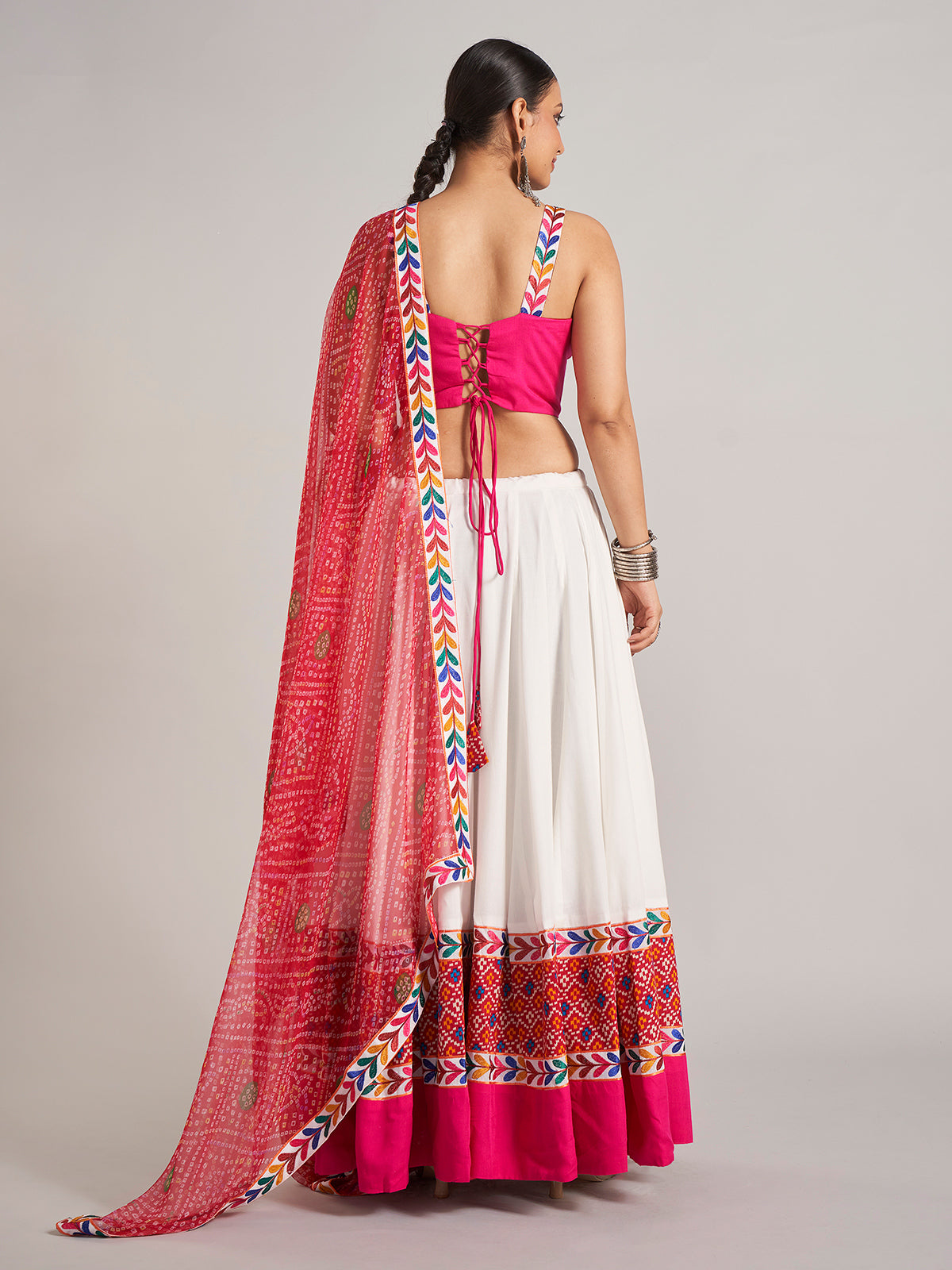 White and rani pink silk navratri chaniya choli