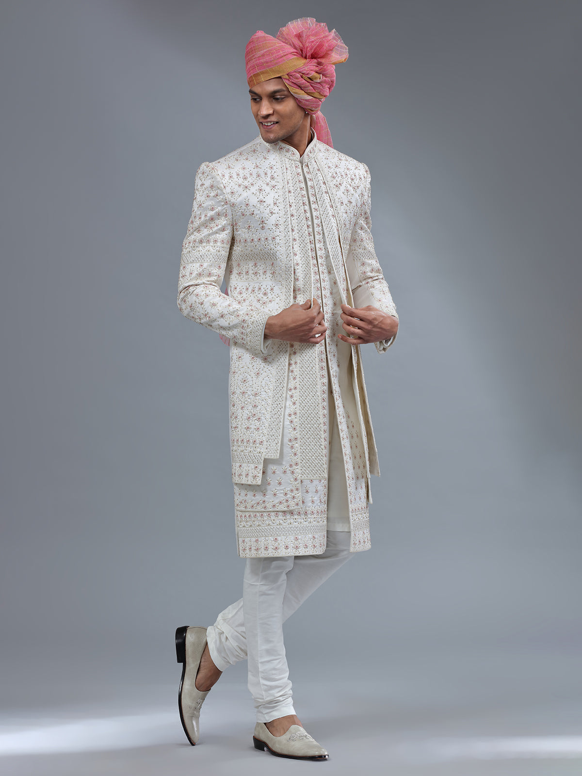 White jacket style sherwani with matching bottom