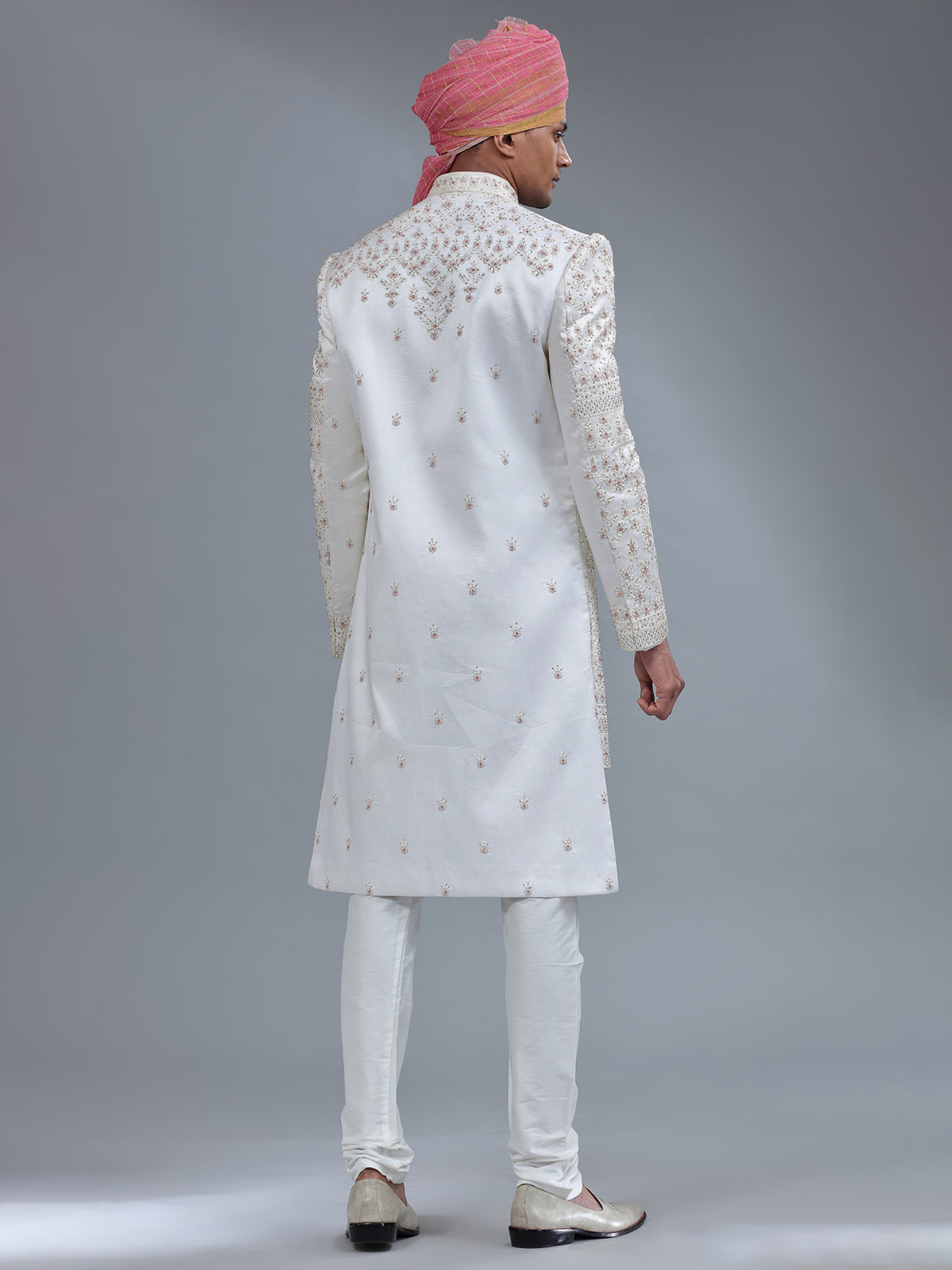 White jacket style sherwani with matching bottom