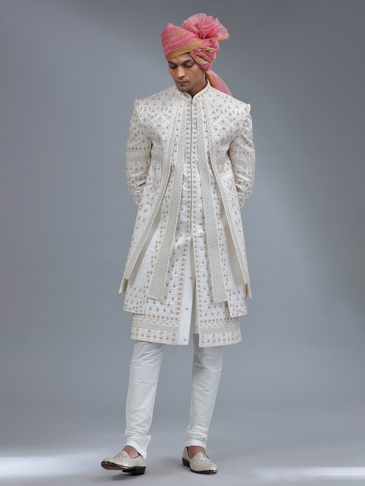 White jacket style sherwani with matching bottom