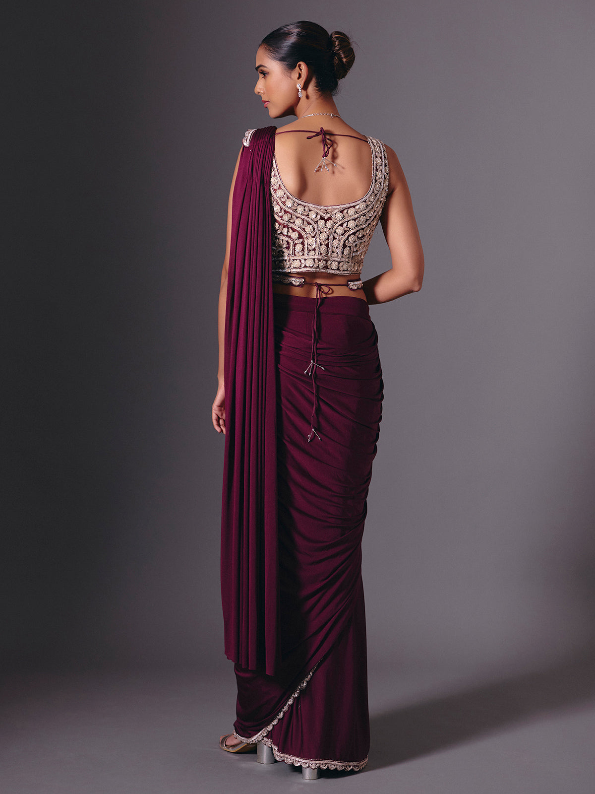 Wine lycra saree with sparkling cutdana and pearl work