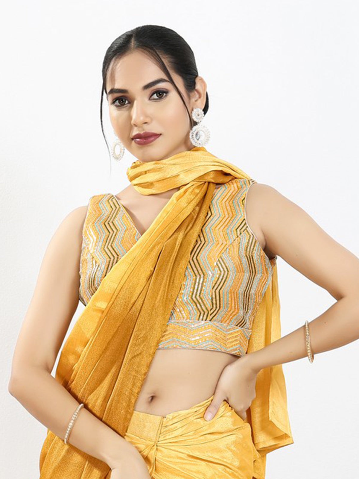 Yellow silk embroidery work sleeveless V neck blouse