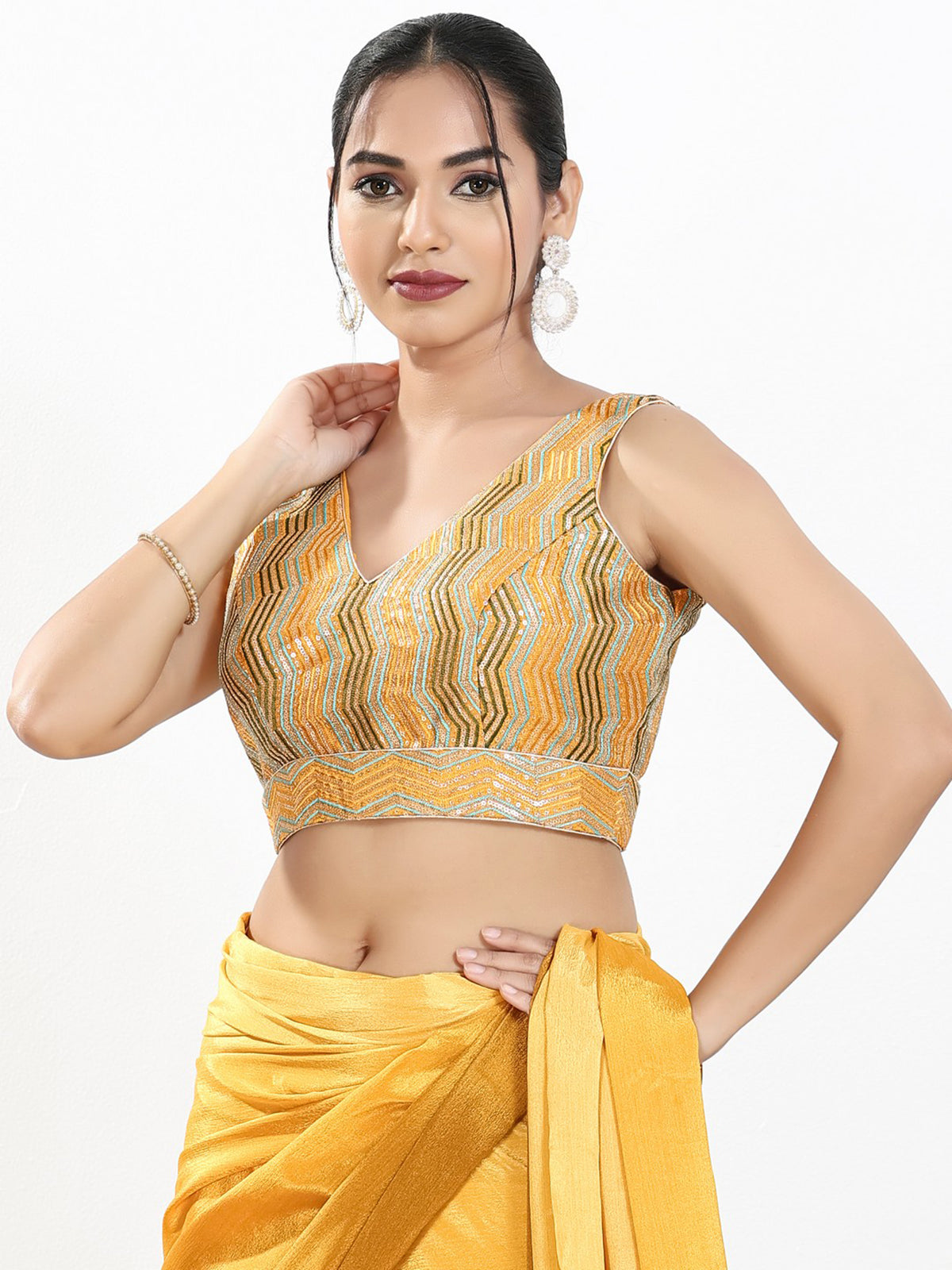 Yellow silk embroidery work sleeveless V neck blouse