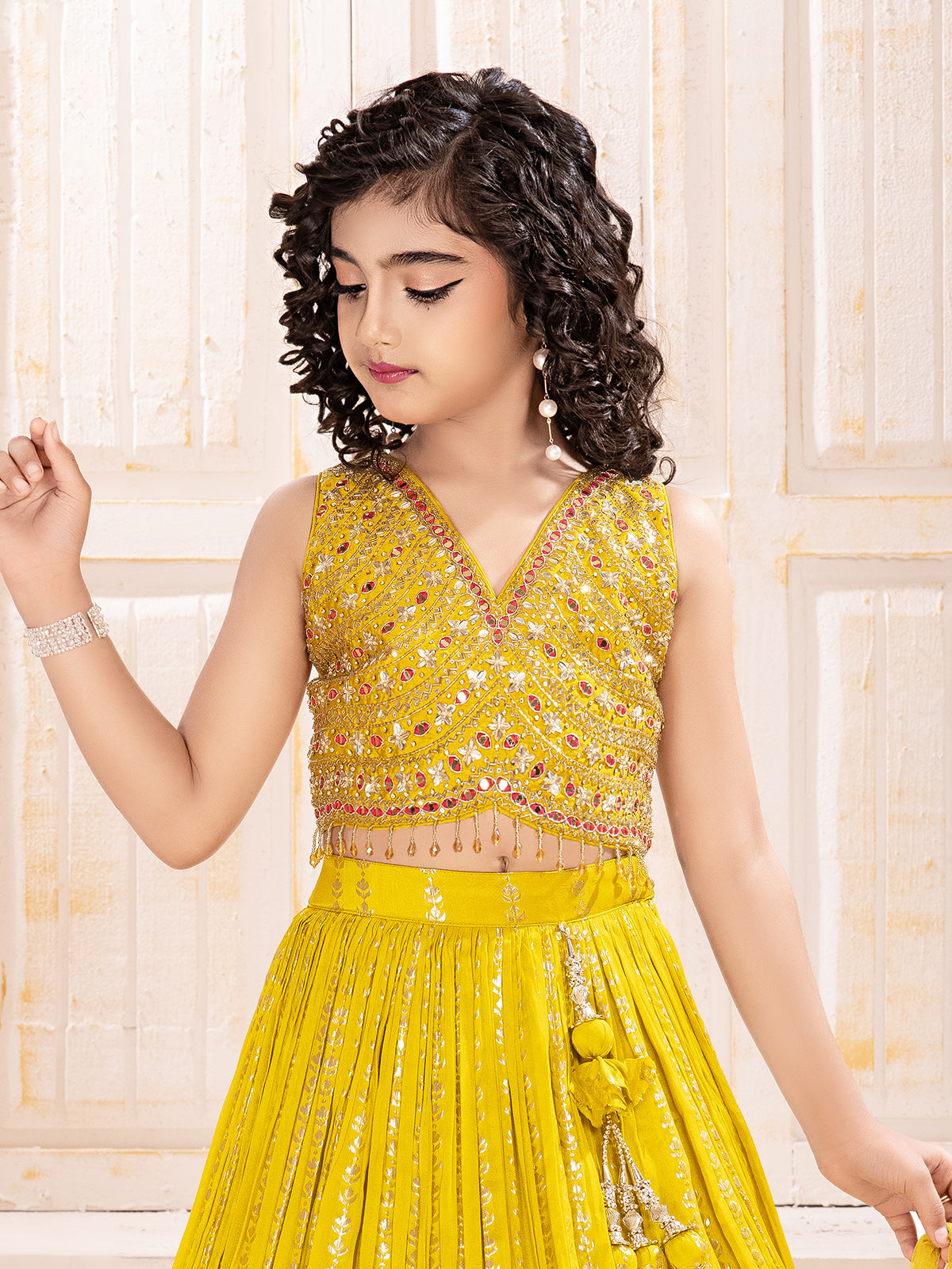 Yellow silk wedding wear lehenga choli with shimmering zari