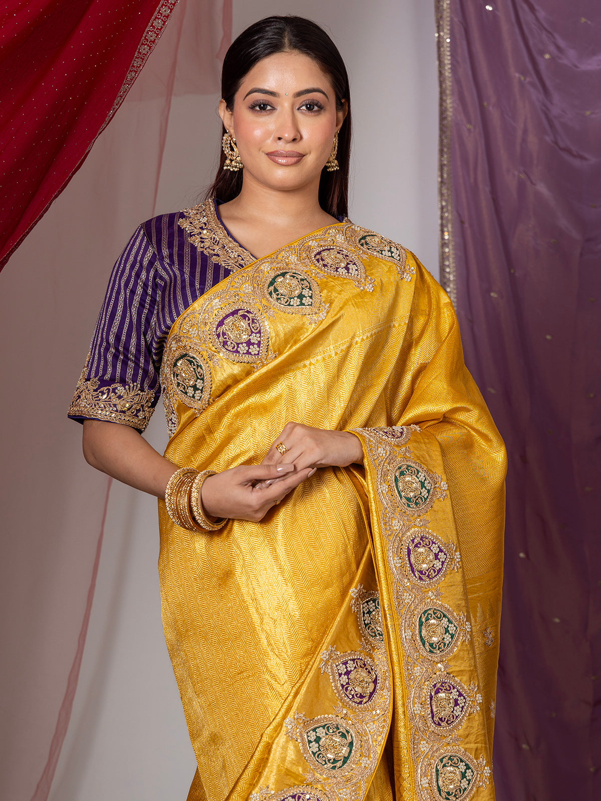 Yellow silk wedding wear saree with sequins work