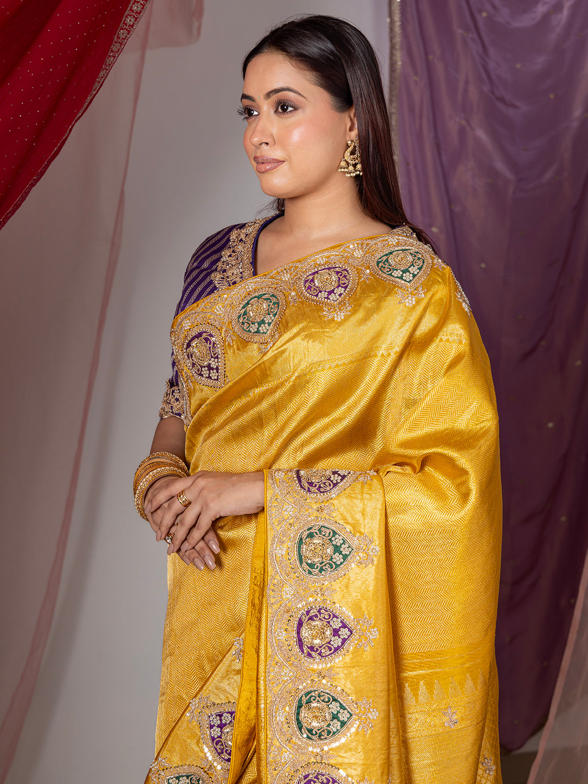 Yellow silk wedding wear saree with sequins work