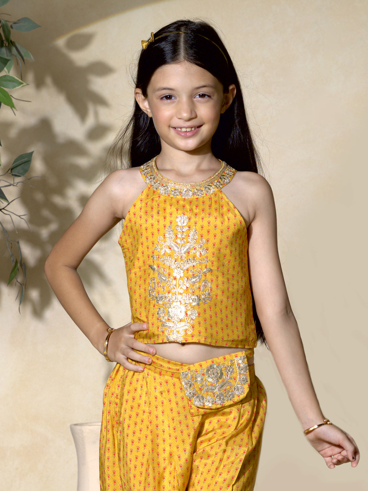 Yellow printed silk salwar suit for girls