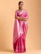 Pink silk saree enhanced with elegant zari detailing