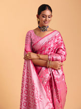 Pink silk saree enhanced with elegant zari detailing