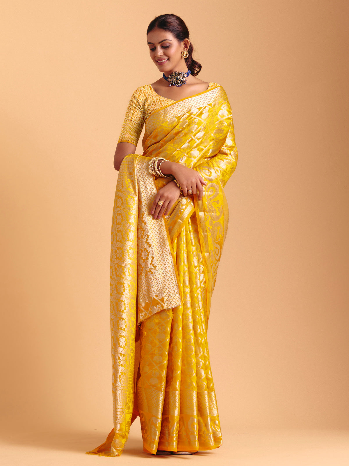 Mustard yellow silk saree with zari work