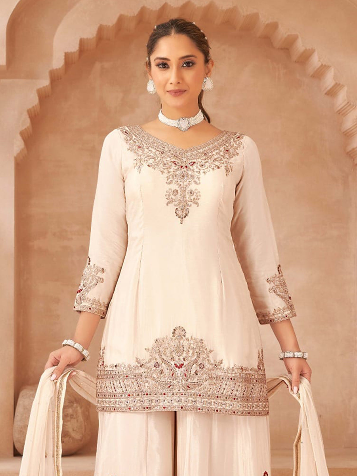 Off white silk palazzo suit with resham embellishment