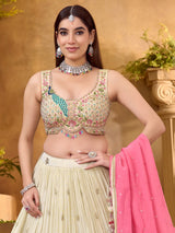 Cream silk lehenga choli with embroidery work