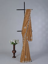 Dark beige cruss tissue silk saree with bead embellishments