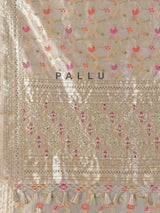 Cream minakari tissue silk saree with colorful motifs