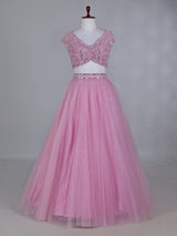 Light pink net lehenga choli with mirror and stone work
