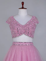 Light pink net lehenga choli with mirror and stone work