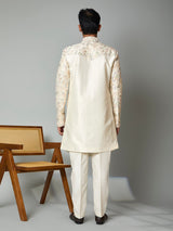 Cream silk indowestern set with embroidered brooch