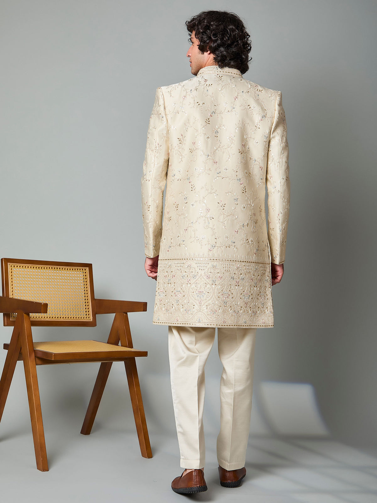 Beige silk embroidered indowestern set with brooch