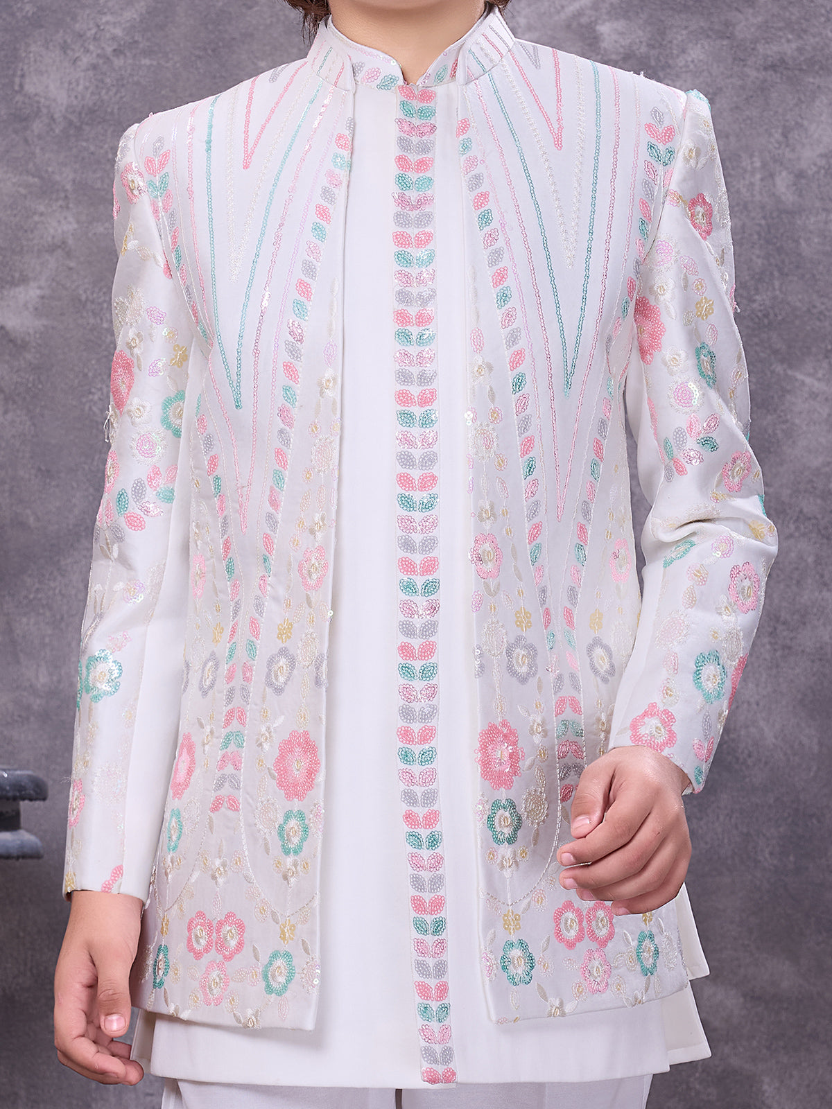 Graceful white silk jacketed celebration ensemble