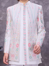 Graceful white silk jacketed celebration ensemble