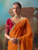 Orange fancy tissue silk embellished saree