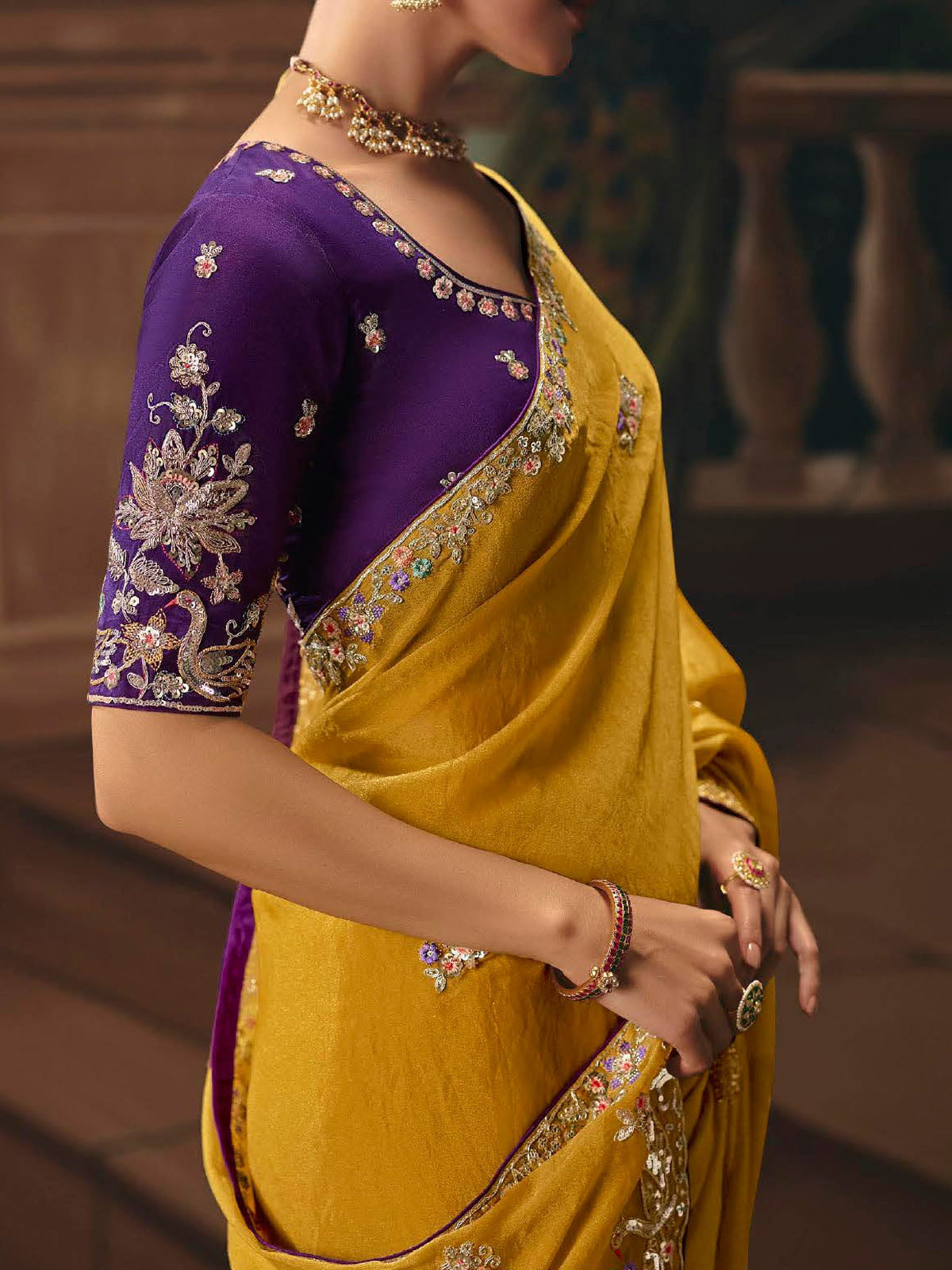 Mustard yellow silk embellished saree