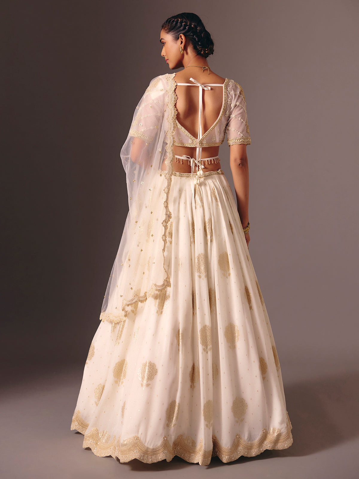Cream silk georgette designer lehenga choli with pearl work