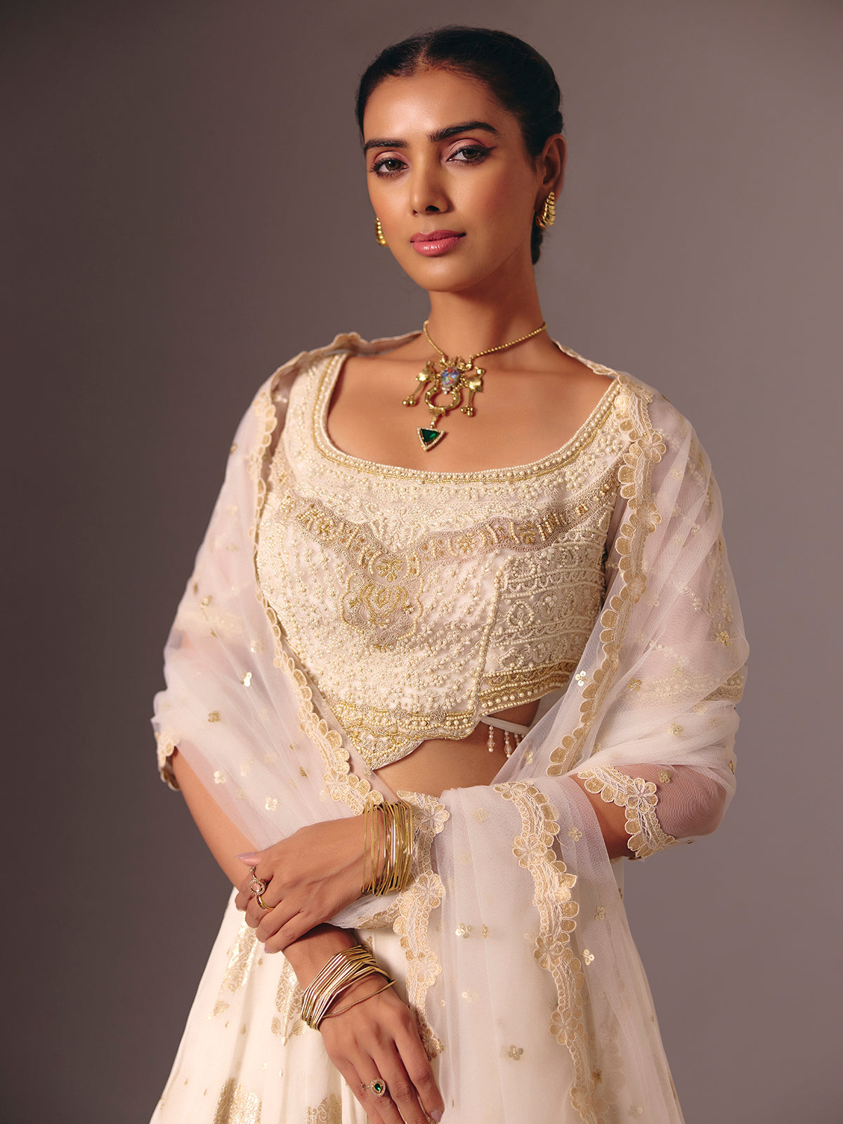 Cream silk georgette designer lehenga choli with pearl work